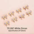 Detail of 14x10mm 18K gold plated bow pendants with inlaid purple cubic zirconia - Bow (14*10mm) / Purple