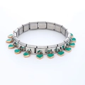 Detail of modular stainless steel bracelet with turquoise enamel heart charms - 0017-green Heart Section 1