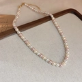 Detail of multi-color pearls with adjustable gold lobster clasp on jewelry tray - 37# Pink 6mm Pearl Necklace
