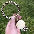 Handheld leopard print PU leather keychain ring with wood disc and gold tassel - Brown Leopard