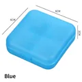 Blue 4-slot square portable pill box with medical cross lid, size 6x6x2cm - Blue