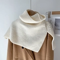 Detailed view of the thick knit texture and high neck design of this beige scarf - Off-white