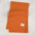 Orange rib-knit winter scarf in soft thick yarn with h.nolamduo label detail - Orange
