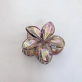 Tropical plumeria hair claw clip with iridescent finish on a clean white background - Frangipani Hair Clip / Pack of 12 (8x7x4cm) / Iridescent Transparent Cocoa
