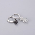 Detailed view of silver hoop earrings featuring pavé bear and magenta heart charms - Bear Heart Earrings - Silver