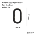 Detail showing 23x14mm black enamel oval pendant dimensions and gold-plated copper material - Black
