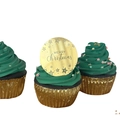 Close-up of golden acrylic Merry Christmas cupcake topper on a festive green frosted cake - Gold Star Style / Gold