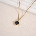 Minimalist gold necklace featuring a square black zircon pendant with four-prong setting - Black