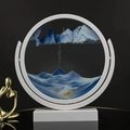Round sand art decor with white frame and blue-white flowing sand on a base - 12 Inch White Frame Rotate Blue