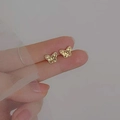 Elegant gold butterfly stud earrings featuring a minimalist vintage-style design - Gold Delicate Butterfly