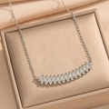 Silver spike necklace with inlaid gemstones in a premium jewelry box presentation - Silver Necklace