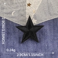 Black star embroidered patch for clothing with 2.9cm dimensions and detailed stitching - Black