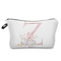 Close-up detail of the elegant pink floral alphabet letter Z print on a white makeup bag - Letter Z Style