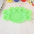 Paleta de pintura plástica verde en forma de flor con 7 pocillos para dibujo escolar - Paleta Garra de Gato Verde