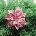 Close-up of pink glitter artificial poinsettia flower for Christmas tree decoration - Pink