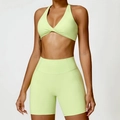 Women's tight neon green yoga set with halter twist sports bra and high waist biker shorts - S / Top And Bottom / Light Yellow Green