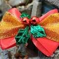Red Christmas ribbon bow with gold edges, green holly leaves and two small red bells - Christmas Bow 13