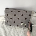 Detail of grey corduroy makeup bag with brown polka dots and metallic zipper closure - Grey Polka Dot Pouch