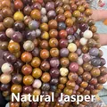 Detailed view of hand-held natural egg yolk stone beads with unique polished textures - Natural Egg Yolk Stone 4mm (Approx. 90pcs) Strand