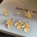 Vintage golden flower jewelry set with floral collar necklace, cuff bracelet and earrings - 3D Petal Jewelry 4-Piece Set / Gold