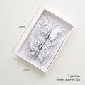 Set di tre fermagli a farfalla argento con glitter e perle in una scatola bianca - Farfalla Argento (Set di 3)