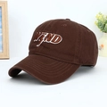 Close-up of brown cotton baseball cap with WIND 3D embroidery and parallel visor stitching - Coffee