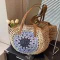 Handmade woven paper rope beach tote with colorful circular pattern and brown leather straps - Blue