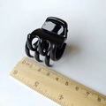 Detailed view of a 3.5cm black glossy square hair claw clip measured with a ruler - 3.5cm / Glossy Black