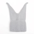 Close-up of light gray knit winter hat featuring soft ribbed texture and unique pointed ears - Gray