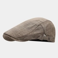Detail view of khaki linen flat cap with adjustable metal buckle and textured fabric - Dark Khaki