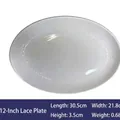 Assiette ovale en céramique blanche de 12 pouces avec dentelle gaufrée élégante - Assiette creuse ovale à relief de 12 pouces