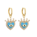 Macro detail of heart-shaped evil eye earrings with blue enamel and zircon inlay - Sky Blue Enamel Heart