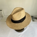 Macro detail of natural straw Panama hat with fine weave and wide black ribbon trim - M (56-58cm) / Black Strap
