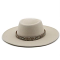 Close-up of beige flat top wool hat featuring a colorful geometric woven ethnic band - M (56-58cm) / Beige