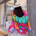 Ethnic style oversized shawl scarf with vibrant floral print and bold artistic lettering - Zumba Colorful