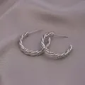 Elegant silver twisted rope hoop earrings with a textured spiral design for women - E-071---Platinum