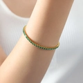 Vergoldetes Tennisarmband mit einer Reihe funkelnder grüner Zirkonia für Damen - Grüner Zirkon Gold