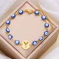 Evil eye bracelet with letter Y charm in gold finish and blue beads on silk fabric - Letter Y