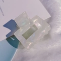 Square acetate claw clip with iridescent pearlescent finish on white plush fabric - Fairy White