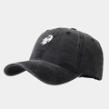 Detailed view of white ghost embroidery on vintage dark grey washed cotton baseball cap - Adjustable / Black