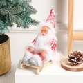 Christmas Santa doll on wooden sleigh with red knit hat and white fluffy beard ornament - Red Plaid