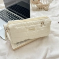 Detailed close-up of quilted cream storage bag with cute rabbit embroidery and zipper strap - Rabbit Embroidered Quilted Pencil Bag