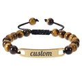 Macro detail of tiger eye stone beads and customizable gold-plated curved metal bar - Tiger Eye Stone