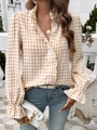 Close-up of yellow plaid blouse with ruffled stand collar and delicate button detail - Oatmeal