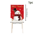 Christmas chair cover featuring a red snowman design with Merry Christmas lettering - Snowman with Plaid Scarf