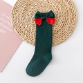 Detail of dark green knee-high socks with a red and green bow on a woven mat - Dark Green (Red Green Four Bows)