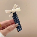 Dark blue spiral telephone cord hair tie with a cream-white handmade bow detail - Rice White [Candy Bow]