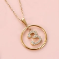 Macro view of gold-plated number 3 pendant necklace with micro-pave cubic zirconia - Gold Number 3