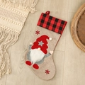 Christmas stocking with red plaid cuff and gnome decor on beige linen fabric - Five-pointed Star