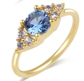 18K gold plated nose ring featuring a round blue zircon and clear side stones - Style 10